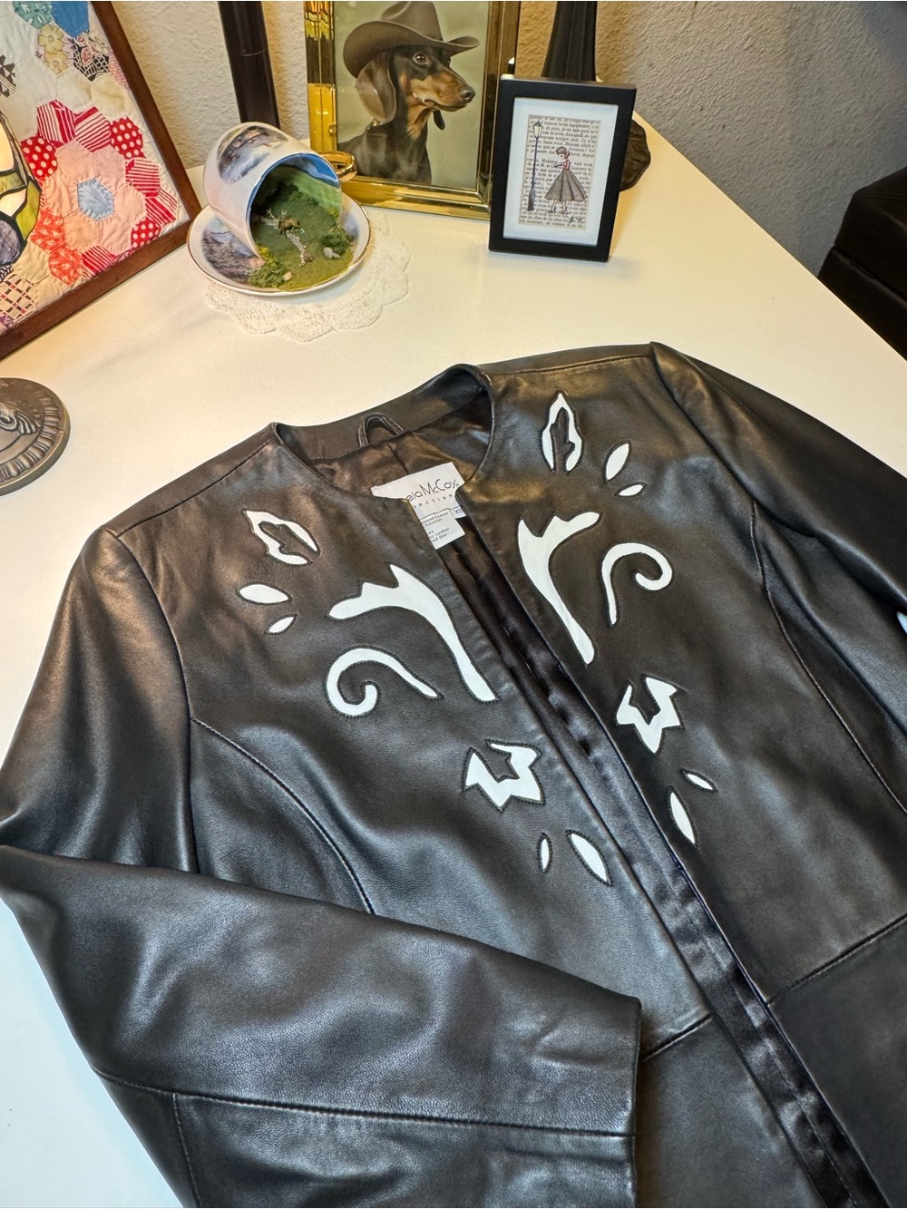 Pamela McCoy Black Leather Jacket with White Cutout Motif XS Like New